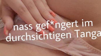 Wet fingered in a transparent thong