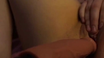 girl masturbates and fucks herself with sex machine to orgasm
