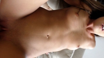 Fitness girl rides in a reclined position