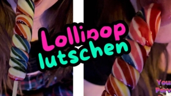 sucking on a lollipop