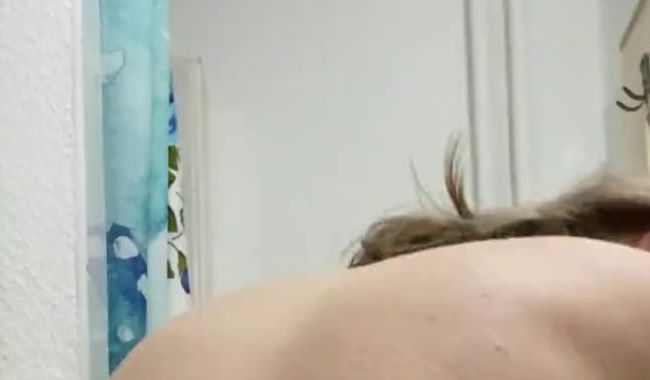 Undressed in the bathroom (no sound)